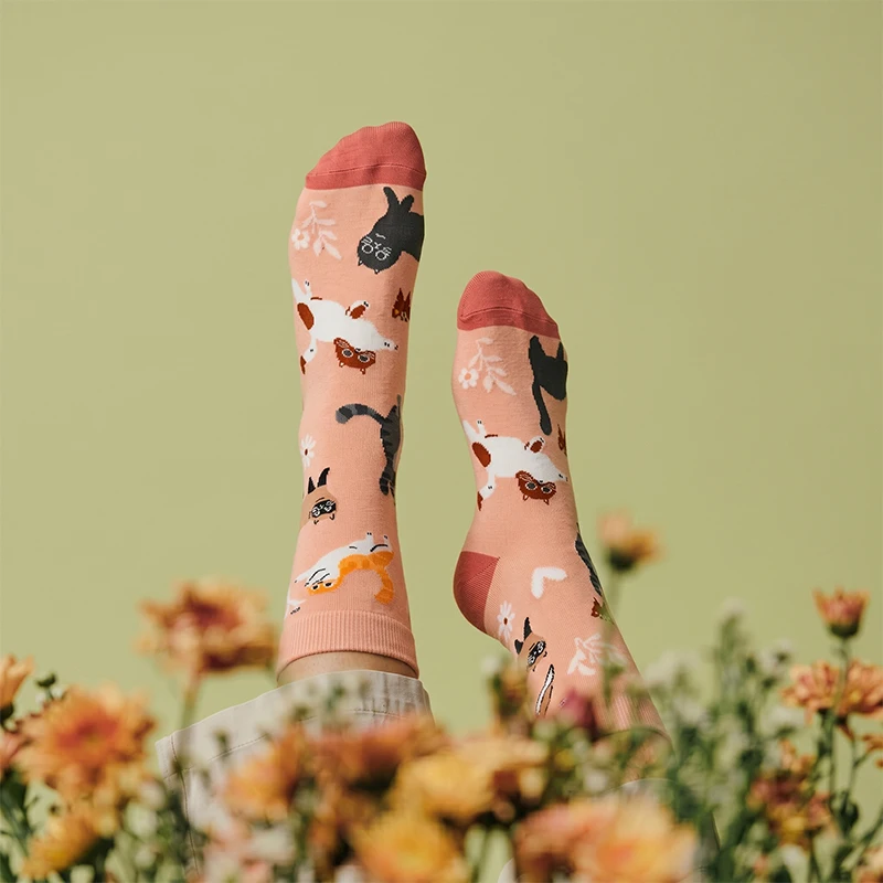 

1 Pair of Unisex Socks in Light Peach Color with Multi-Colored Cat and Butterfly Floral Patterns, Deep Peach Pink Contrasting Sock Tips, Polyester, Breathable, Fun, Mid-Calf Socks, Suitable for Everyday Wear