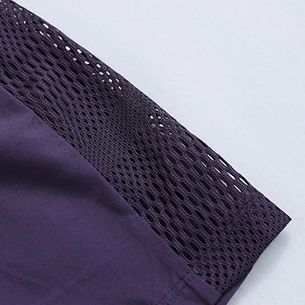 Pantaloncini sportivi da corsa Pantaloncini da yoga con design a rete Tasche laterali Orlo Pantaloncini sportivi elastici Pantaloncini fitness larghi e traspiranti Yoga