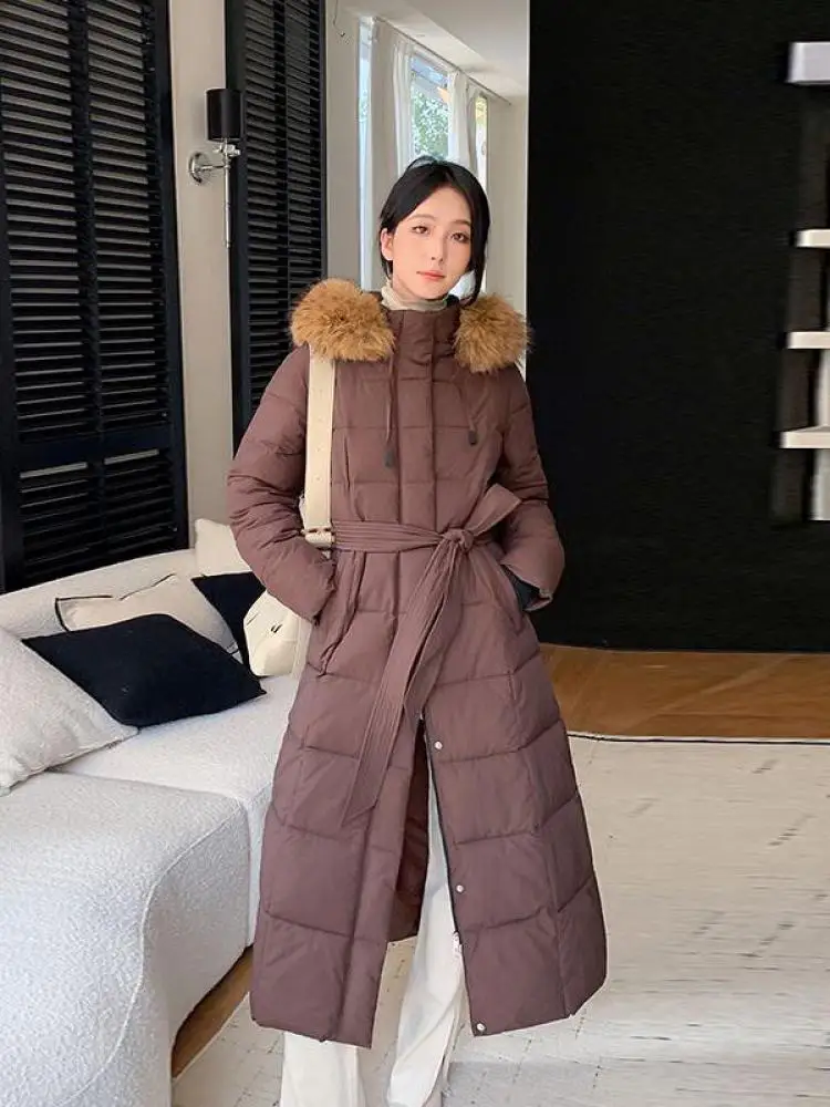 韓国の冬のファッション新しい固体毛皮のようなフード付きロングダウンコットンコート女性厚いパーカーカジュアルルーズシングルブレストオーバーコートシック