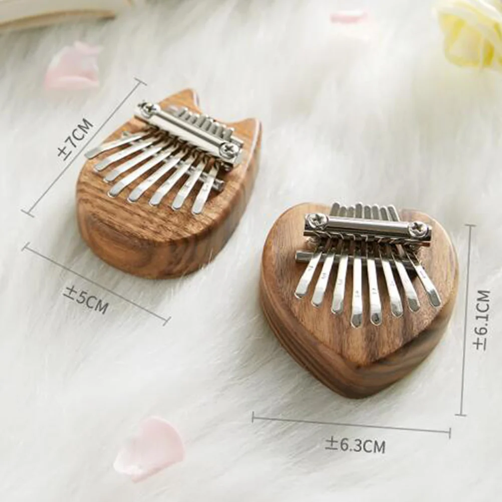 

8 Keys Thumb Piano Acrylic DIY Heart Shape Adjustable Spring Melodious Sound Educational Plaything for Girlfriend Peach