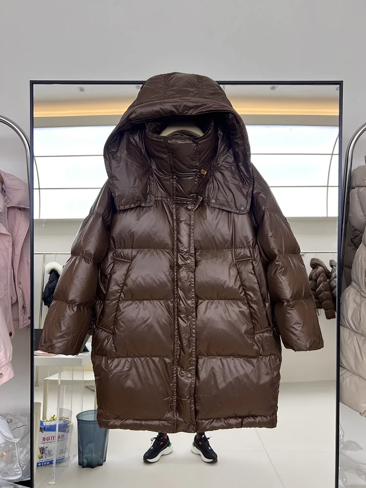 سترة نسائية طويلة بغطاء للرأس فضفاضة بيضاء مبطنة للأسفل سترة عصرية لشتاء 2025 معطف جديد بزرين على شكل قرن البقر بلون سادة #3