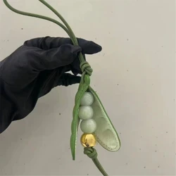 Delightful Pea Shaped Hanging Ornament Versatile and Colorful Key Holder Accessory for Bags and Phones Decoration