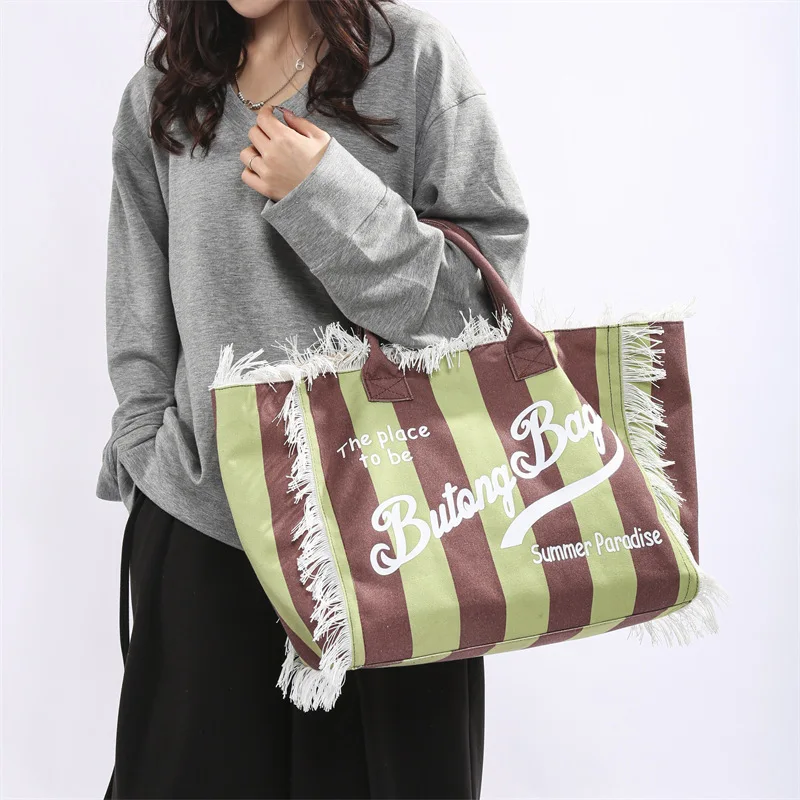 Popular Korean letters tassel canvas bag large-capacity bag simple commuting students to single shoulder Tote bag