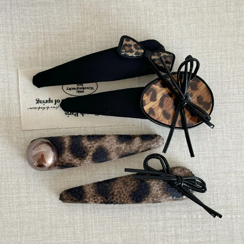 Design sense leopard print high sense hairpin retro fashion pearl metal bow temperament bangs clip hairpin hair accessories