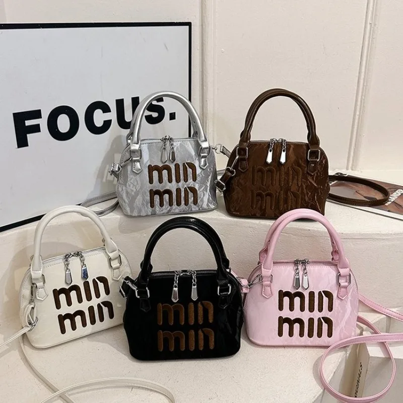 

Элегантные минималистичные сумки для подгузников для женщин, классическая дизайнерская сумка-мессенджер, стильная кожаная сумка для поездок на работу, модная однотонная сумка.