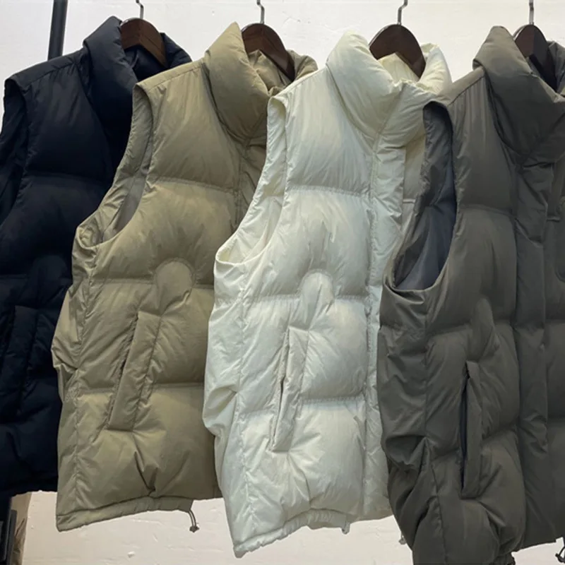 Chaqueta de plumón para mujer, nuevo abrigo de invierno europeo, chaleco sin mangas, chaleco grueso y cálido, chaleco con cuello levantado a rayas para mujer 2025