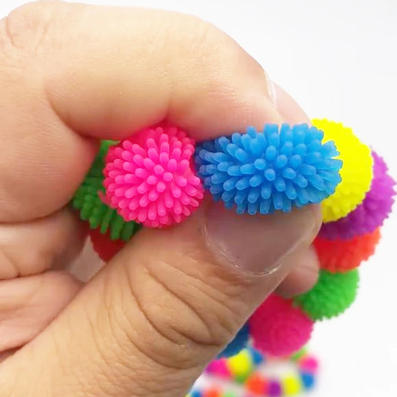 12 sztuk Multicolor kolczasty żywopłot bransoletka z kulką nadgarstek nowość zabawki typu Fidget wycisnąć Squishy Sensory Stress Relief antystresowa zabawka