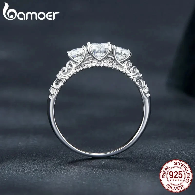 BAMOER 1.1CTTW Round Moissanite Ring for Women, White Gold Plated D Color VVS1 Lab Diamond 925 Sterling Silver Engagement Ring