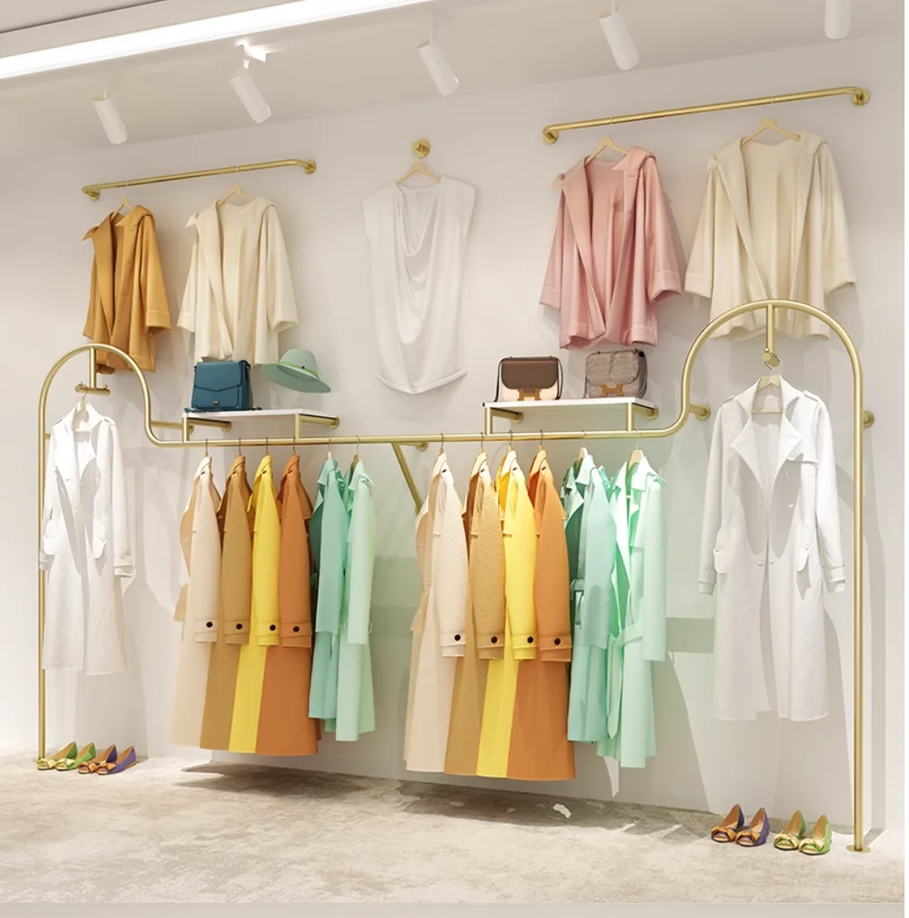 Clothing store display shelves for children's wear and women's wear on the wall floor double hanging clothes hanger