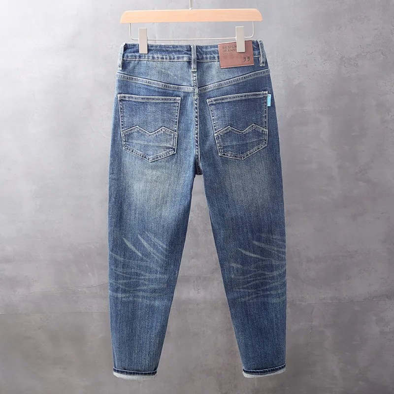 Celana Jeans Pria Musim Semi/Gugur 2025 Gaya Korea Water Washed Serbaguna Slim Fit Small Foot Elastis Model Conical