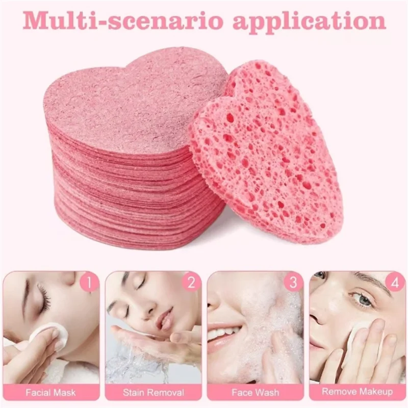 แผ่นฟองน้ำล้างหน้าใช้ซ้ำได้สีชมพูแบบบีบอัดแผ่นทำความสะอาดผิวหน้าธรรมชาติสำหรับขัดผิวเพื่อทำความสะอาดรูปหัวใจ
