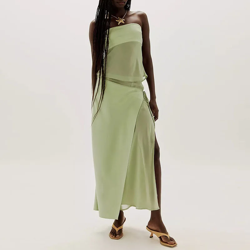 

Модный комплект для вечеринок: облегающая юбка и элегантный топ без бретелек. Сексуальный женский комплект из 2 предметов: топ без рукавов и однотонная длинная юбка.