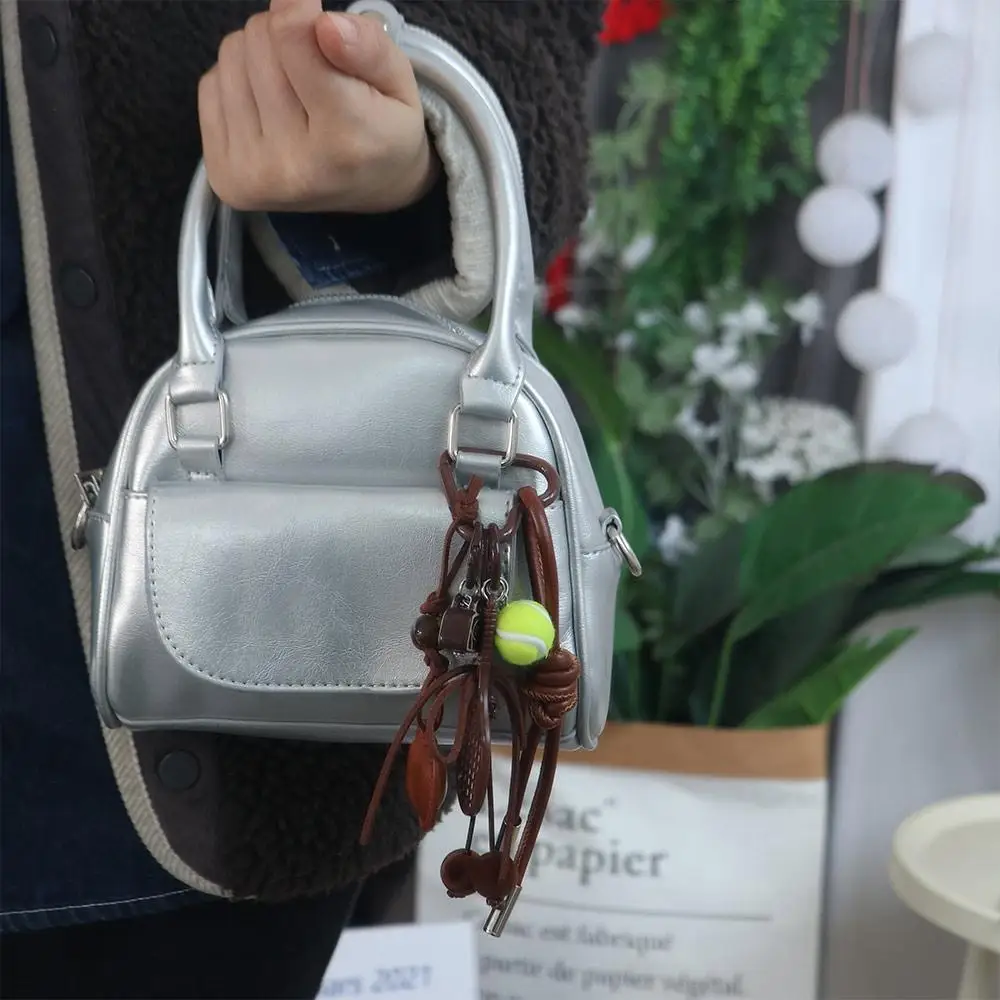 Miu Style marron arc coeur sac pendentif en cuir sac à dos décor Tennis porte-clés mignon à la main coréen charme corde porte-clés