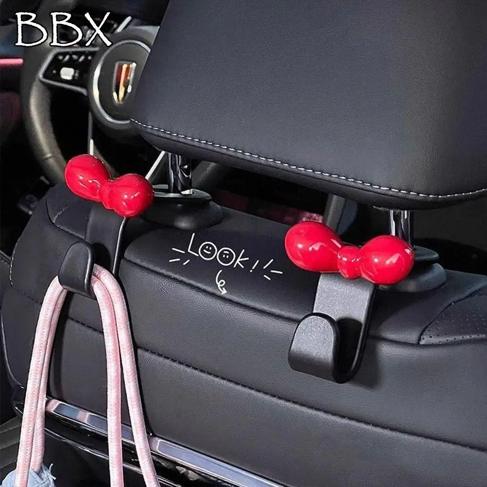 

4Pcs Dopamine Car Seat Back Hook Bowknot Practical Sundries Back Storage Hook Durable Multi-functional Seat Back Hanger