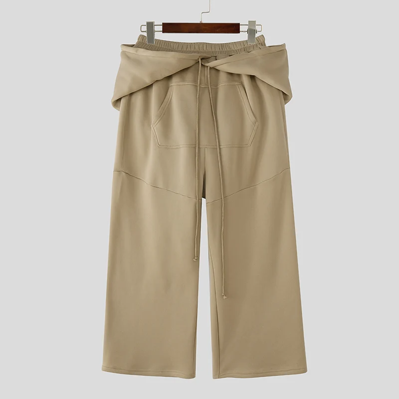 

INCERUN Men Irregular Pants Solid Color Elastic Waist Casual Trousers Men Streetwear Loose Joggers Workout Fashion Long Pants