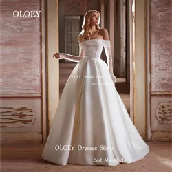 OLOEY Elegant Ivory Off Shoulder Wedding Dress Customized Long Sleeveless Floor Length Sweep Train Bridal Gown Pleats Satin