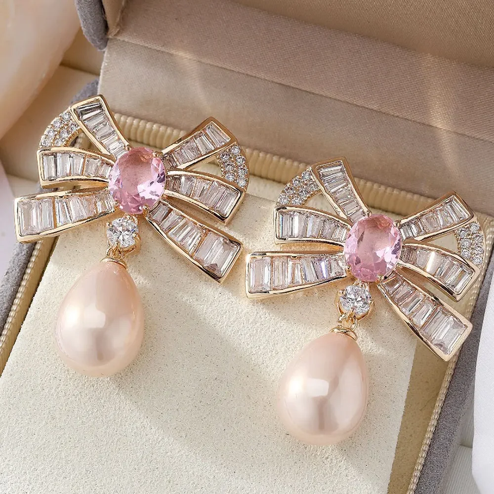 

Soramoore New Luxury Vintage Bow Oval Earrings For Women Wedding Party Hollow Engraving Dubai Bridal Earrings Fashion Jewelry