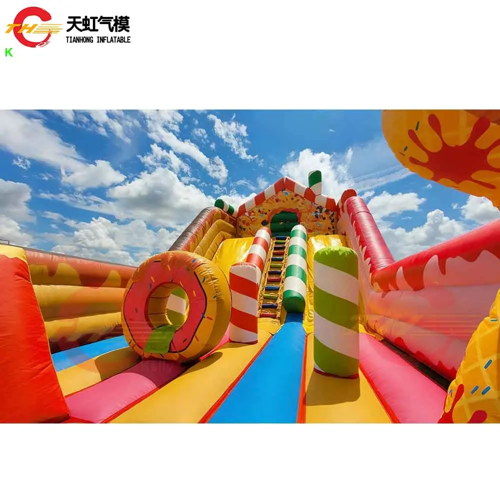 Parco giochi gonfiabile gigante commerciale del buttafuori gonfiabile del pan di zenzero della scivolo di Natale con lo scivolo in vendita