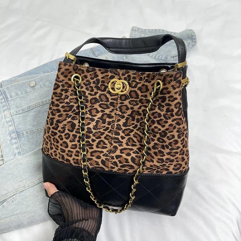 

Trendy Women Bag With Circular Shape And Top Handle Made From Hard Leather Fashion Forward