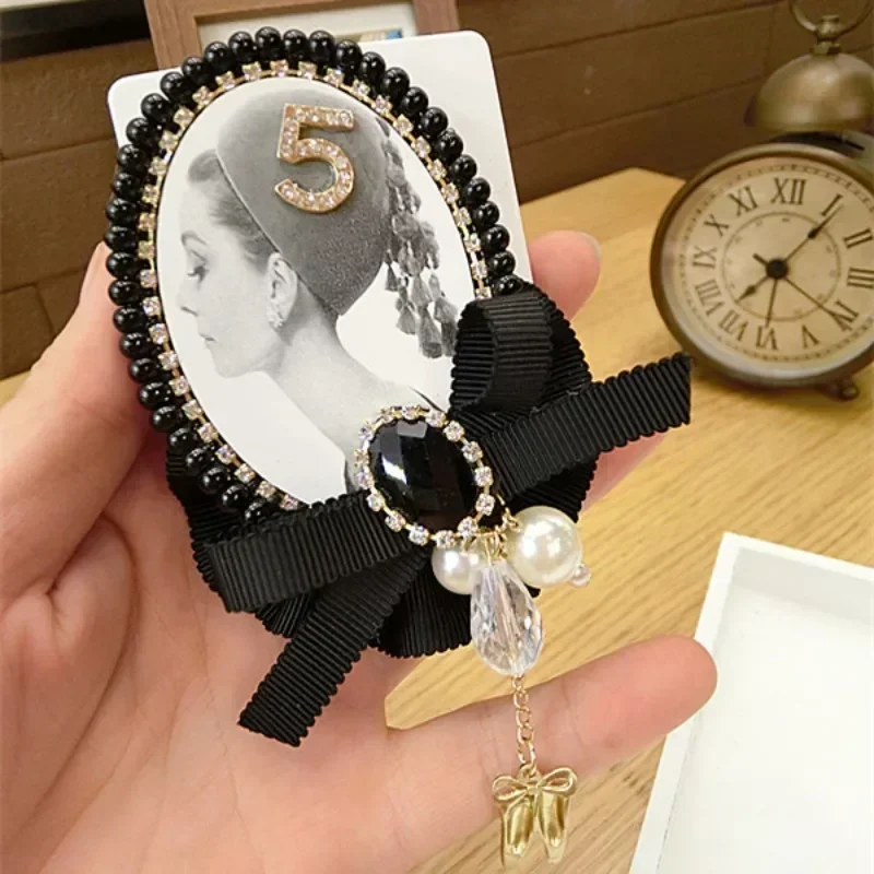 เข็มกลัดพู่ผ้ารูปโบว์สำหรับสตรีมุกคริสตัล MODE Korea เข็มกลัดประดับ gesper syal