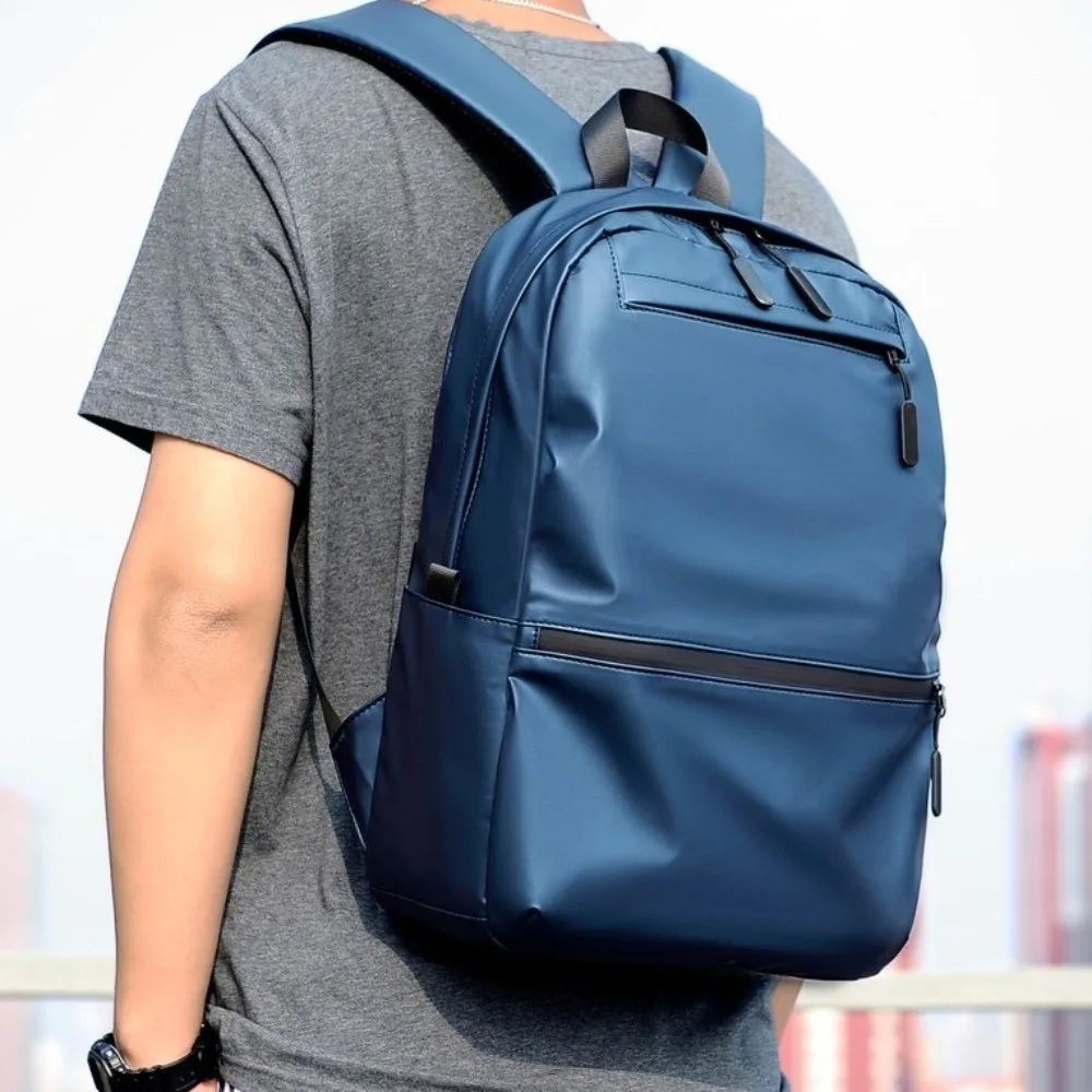 กระเป๋าเป้สะพายหลังผู้ชายขนาดใหญ่แบบลำลอง กันน้ำ มีหลายช่องใส่ของ สำหรับนักเรียน นักศึกษา สีดำ เหมาะสำหรับการเดินทางพักผ่อน กิจกรรมกลางแจ้ง