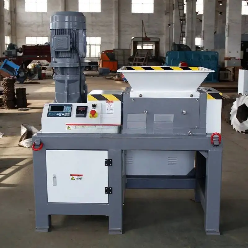 600 نوع التقطيع الهيدروليكي أحادي المحور كسارة صناعية، فيلم المنسوجة كيس القمامة هاين رئيس المواد كسارة