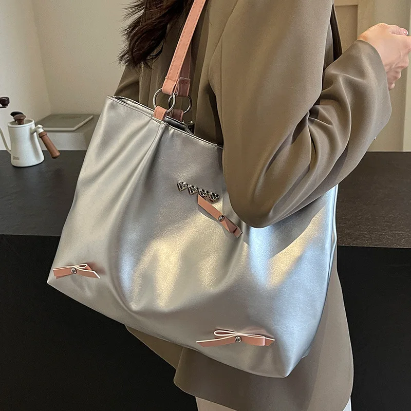 

Large capacity bump color pu leather handbag female bow lovely leisure commuting college student class tote bag