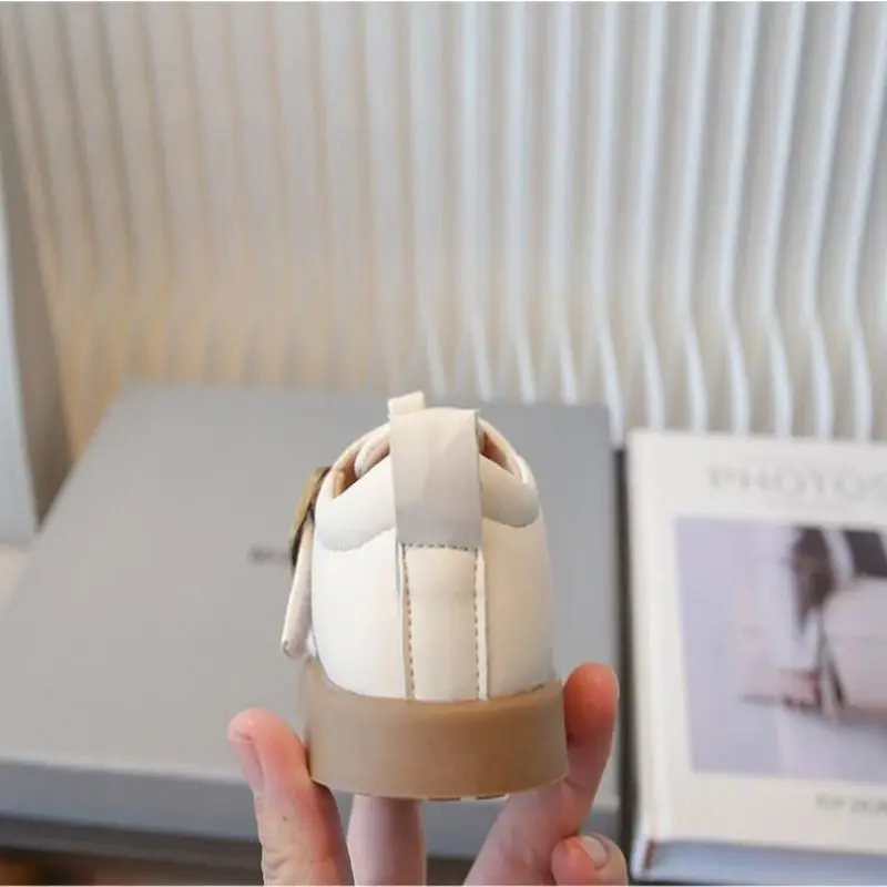 รองเท้าเด็กแบบใหม่ 2 สี พื้นนุ่ม หนังเรียบ รองเท้าเด็กผู้หญิง รองเท้าเจ้าหญิงสำหรับงานปาร์ตี้ ประดับโบว์ ไซส์ 23-34