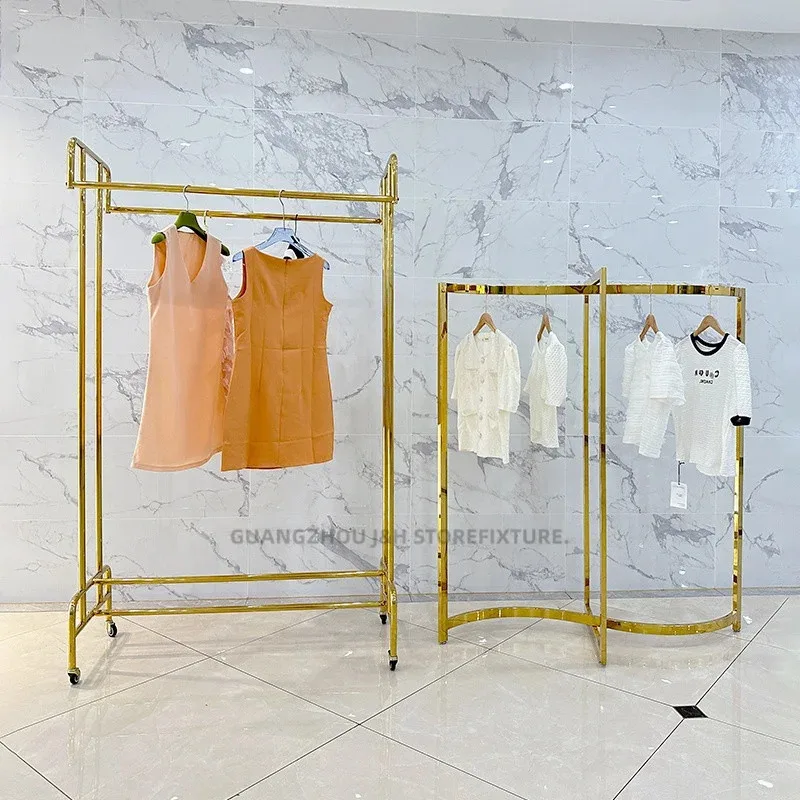 custom.New Style Ladies Boutique Standing Clothing Display Racks Clothing Store Display Stands Shiny Gold Clothing Display