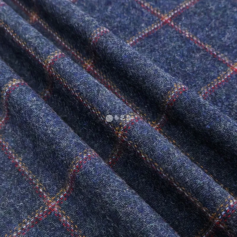 The fabric for suit is made of thin blue-toned striped woolen