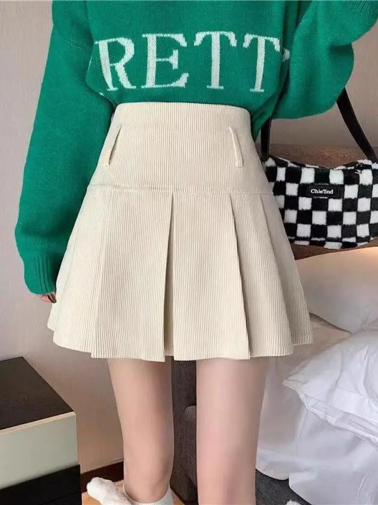 กระโปรงทรงเอ สั้น ผ้าลูกฟูก สีพื้น สไตล์เกาหลี สำหรับผู้หญิง ดีไซน์หรูหรา เซ็กซี่ เหมาะสำหรับใส่ไปคลับ จีบระบาย เอวสูง ใส่ได้หลายโอกาส สำหรับฤดูใบไม้ร่วงและฤดูหนาว