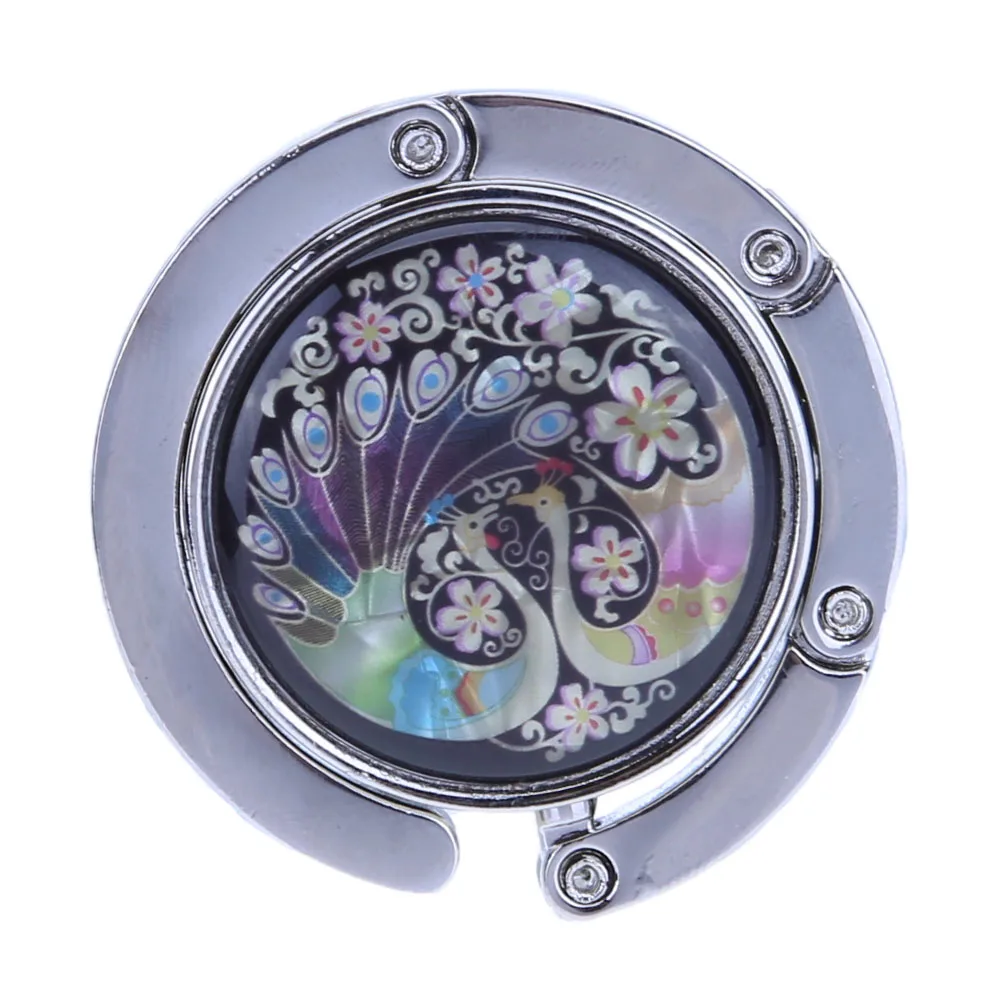 شماعة حقيبة يد قابلة للطي بخطاف محفظة الطاووس لتخزين حقائب اليد على الطاولة