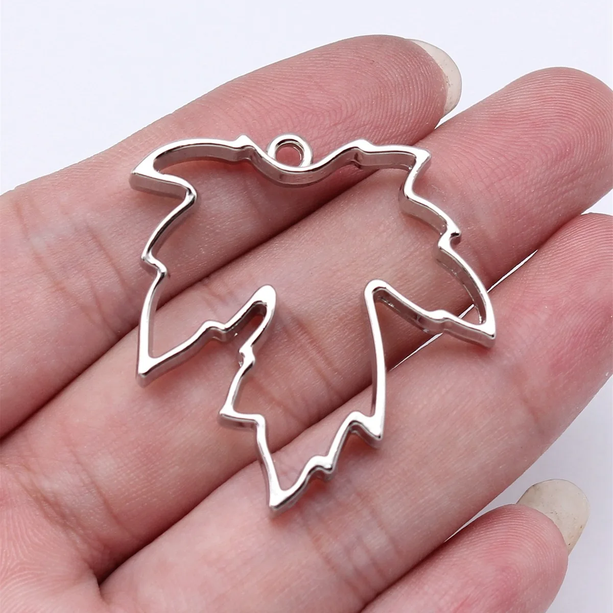 20pcs 37x35x5mm(1.46x1.38x0.2inch) 4 Colors Hollow Geometric Glue Frame Series Leaf-Shaped Border Frame DIY Jewelry Findings