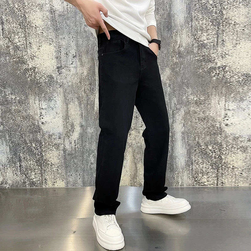 High-end Korean version of the light luxury men\'s jeans autumn and winter black elastic Slim fashion verse men\'s troupers