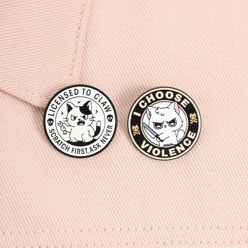 LICENSED TO CLAW / SCRATCH FIRST, ASK NEVER A black and white cartoon cat enamel brooch badge, a jewelry gift for friends