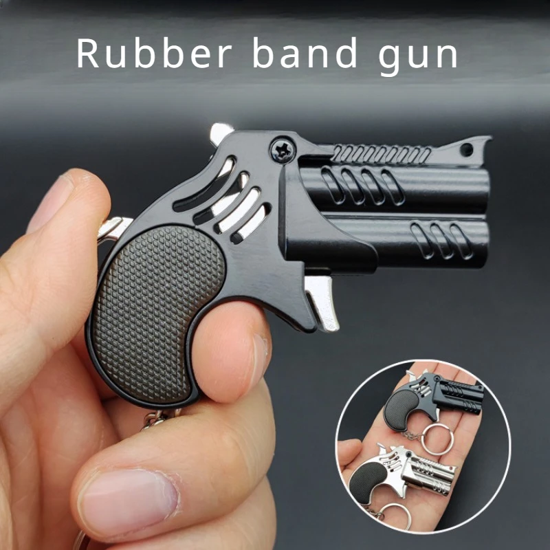 1Pcs Mini Keychain Metal Rubber Band Gun Game Toy Gun Launcher Children's Simulation Pistol Toys Gifts Pendent