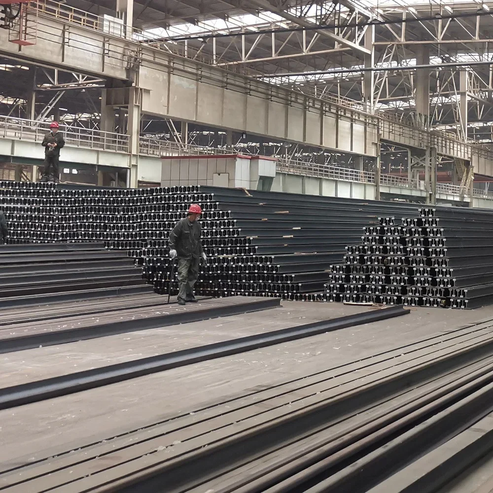 Chinese Standard Light Steel Rail Grade Q235b Shovel Rail Steel Railway Rails Iron Price