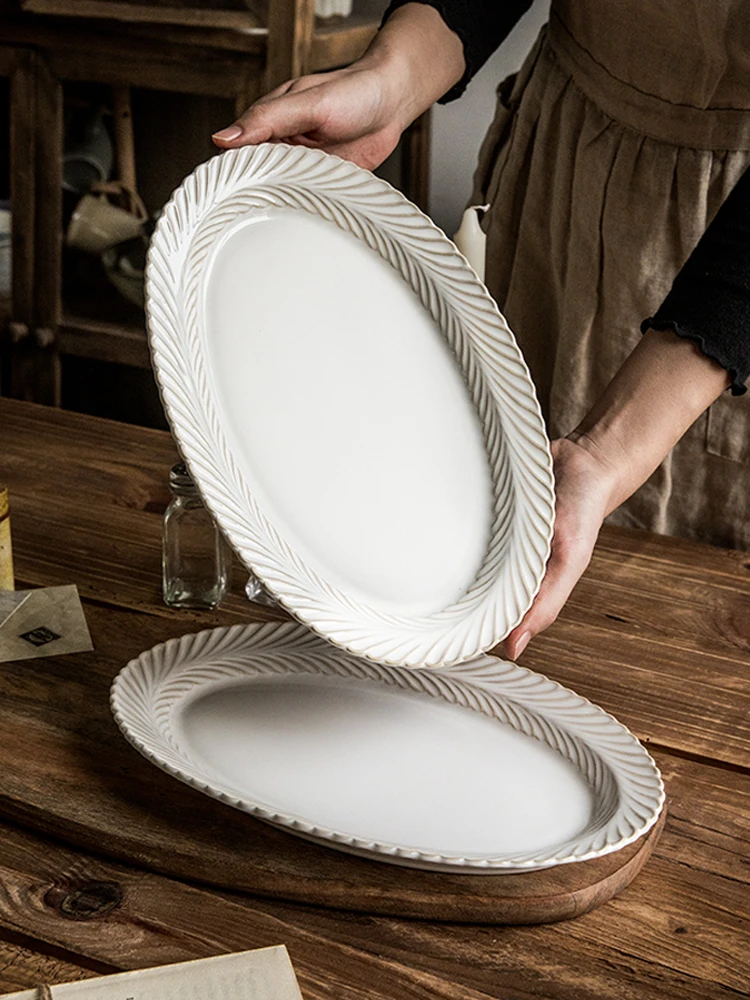 

12 Inch Beautiful Mimosa Oval Ceramic Fish Plate with Embossed Design for Home Use