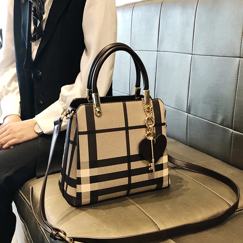 

Hong Kong purchasing genuine leather women's bag new style trendy goddess hand-held one-shoulder versatile plaid crossbody tote