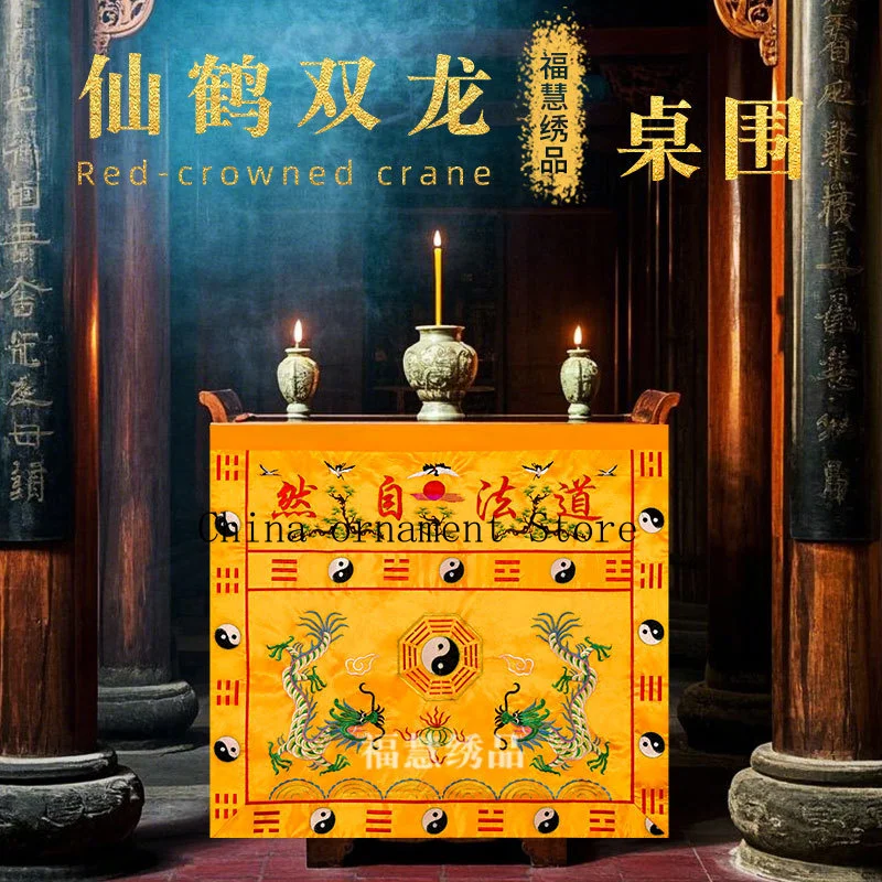 Taoist embroidery featuring cranes, twin dragons, and the Eight Trigrams, used as a table runner or table skirt, embodying the p