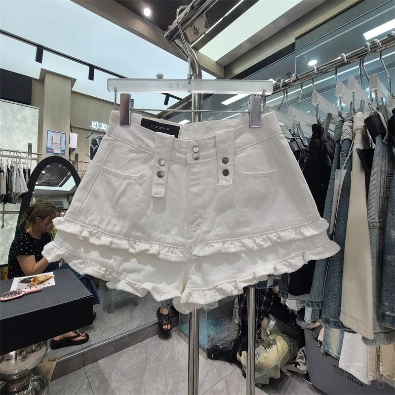 Street style ruffle edge denim hot pants 2025 summer new commuting spicy girl niche slimming fashion shorts for women