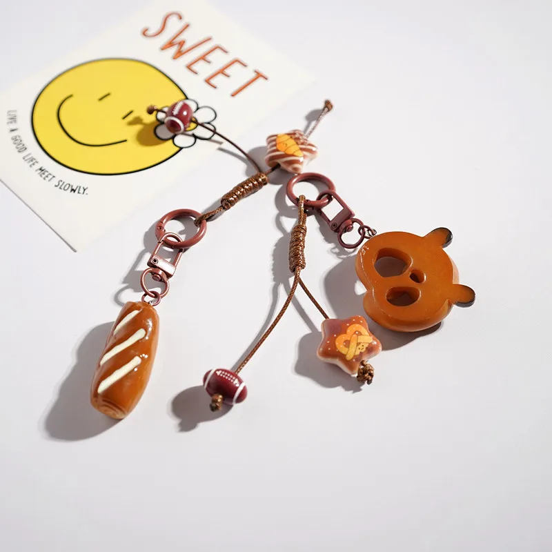 新しい可愛い漫画風アルカリ水パンキーホルダーペンダントバッグペンダント小さなギフト車学校バッグリトルレッドブック