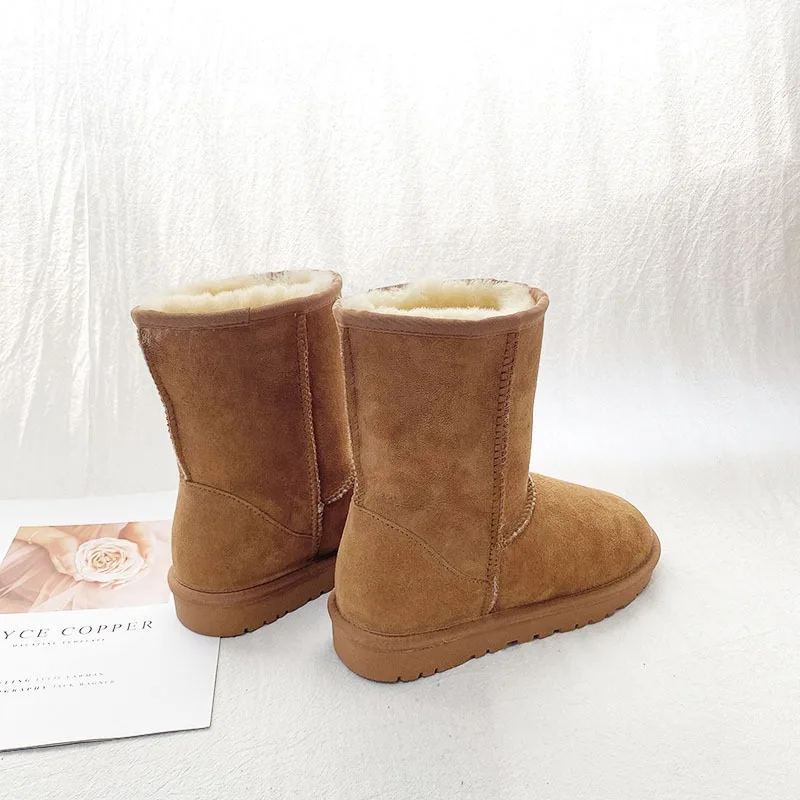 

Grip & Go! Genuine Shearling Mid-Calf Boots. Lock in cozy warmth with winter-safe traction.