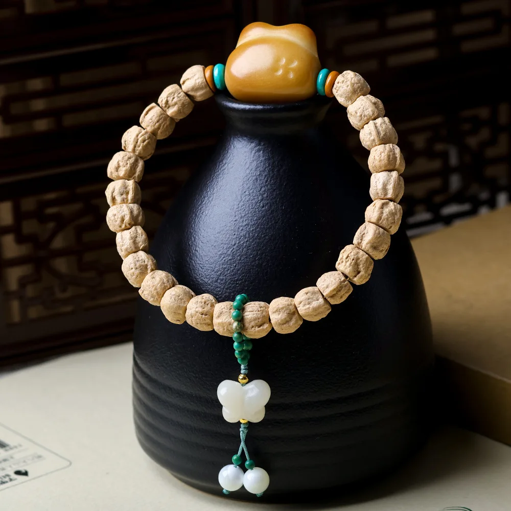 

Original Design: Passion Seed Bracelet, Cultural Play, Ivory Fruit Bear Bodhi Root Butterfly New Chinese Buddhist Bead Bracelet
