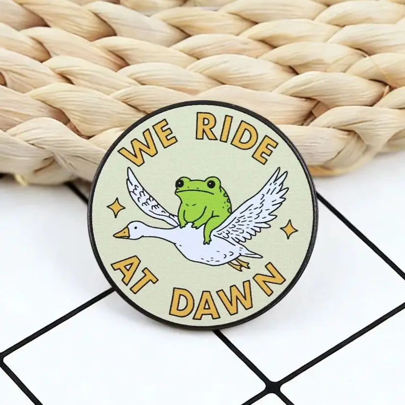 We Ride at Dawn Frog on Goose Enamel Pin Funny Meme Brooch for Backpack Clothing Accessory Cartoon Animal Badge
