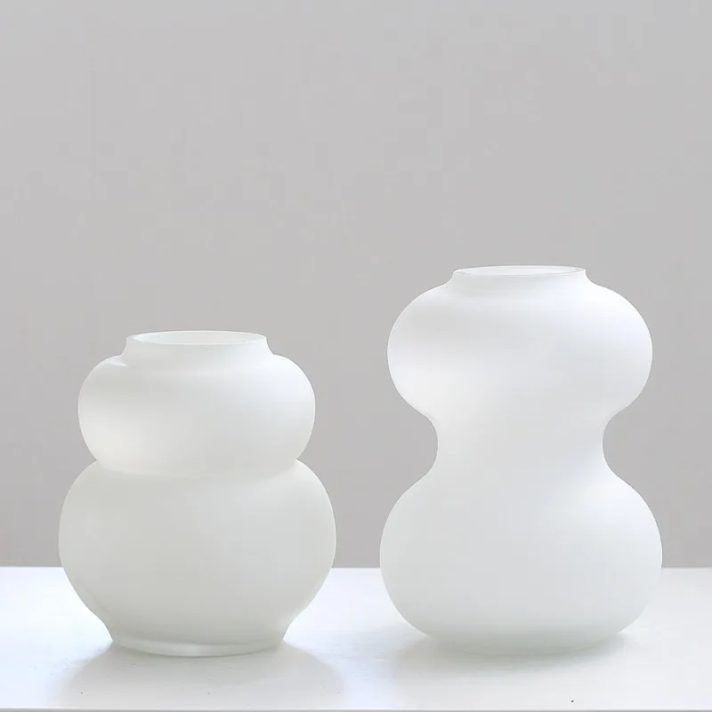 

Simple medieval white porcelain glass flower donut vase desktop living room hotel soft decoration