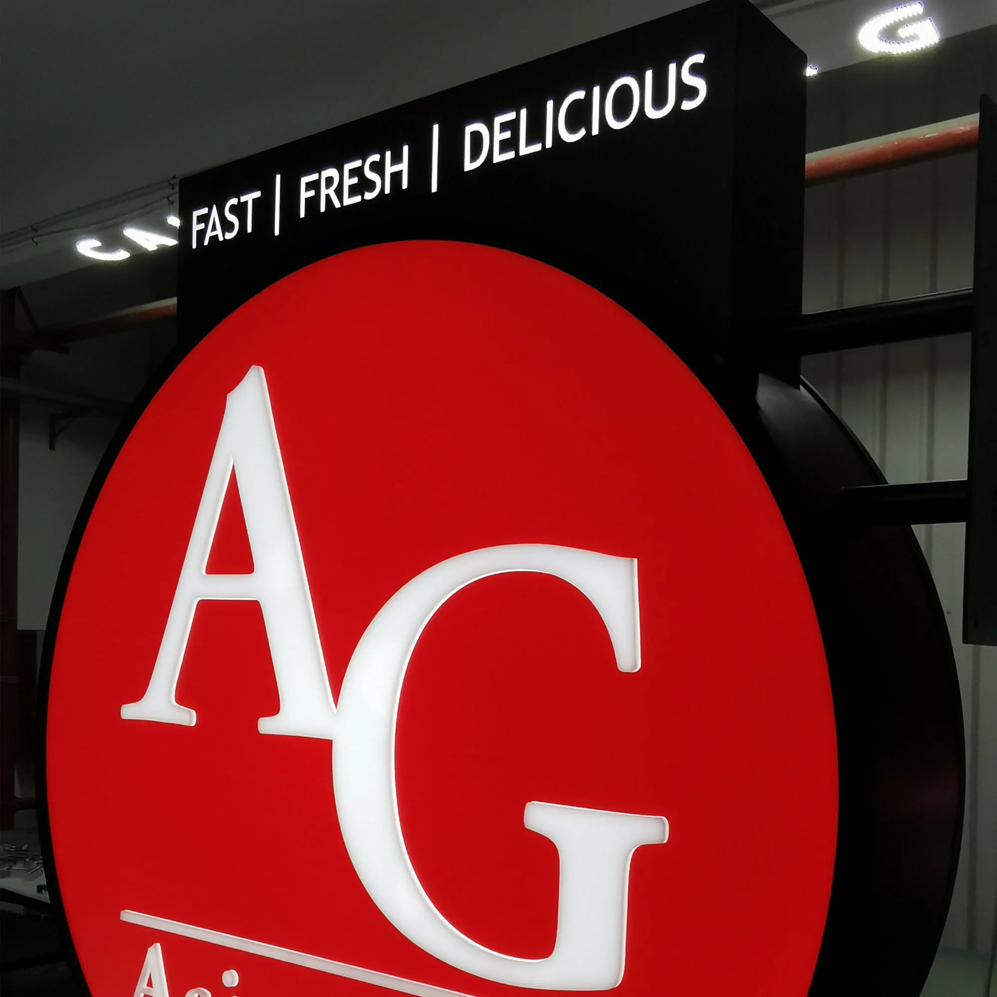 Red vinyl applied with acrylic push through double face light free standing cabinet sign