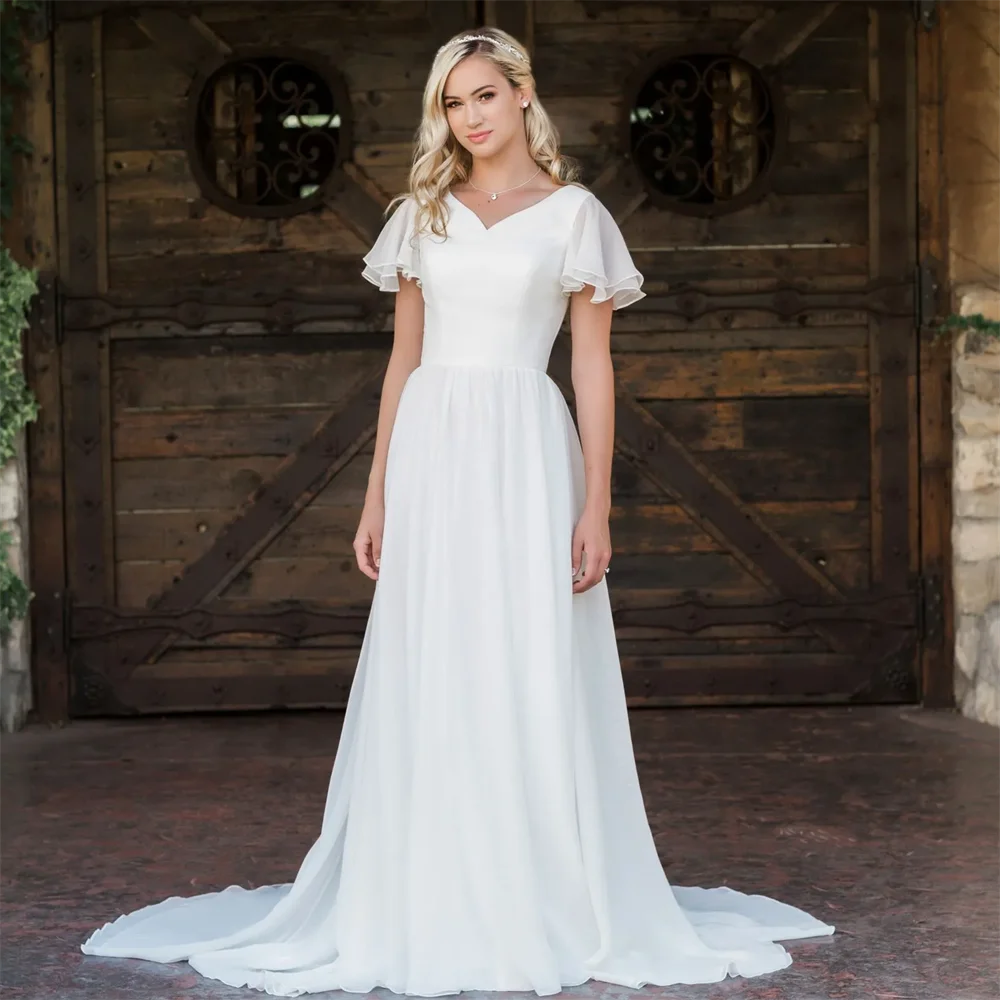 

2020 New A-line Chiffon Boho Modest Wedding Dresses With Flutter Sleeves V neck Buttons Back Informal Beach Bridal Gowns