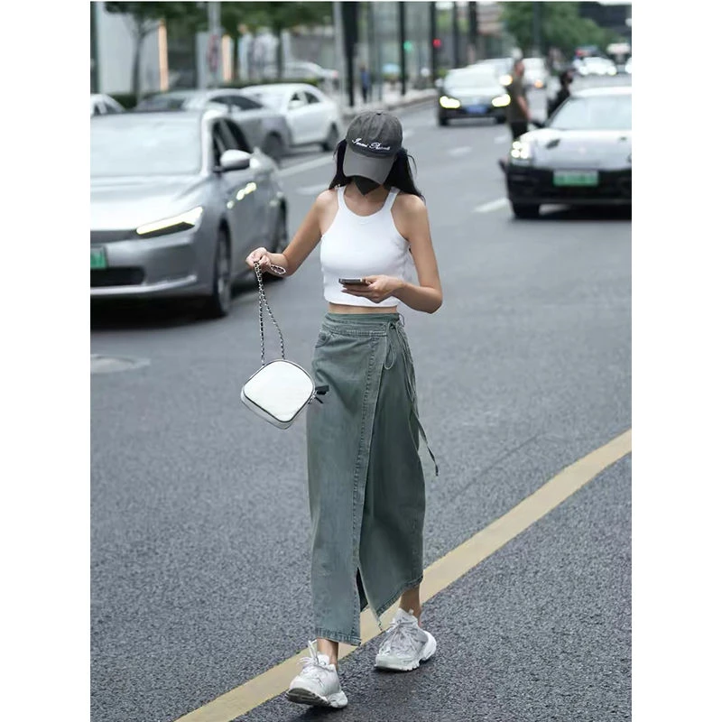 Temperamento falda de viajero diseño sentido correa lavada falda vaquera larga dividida moda de primavera y verano ropa de mujer