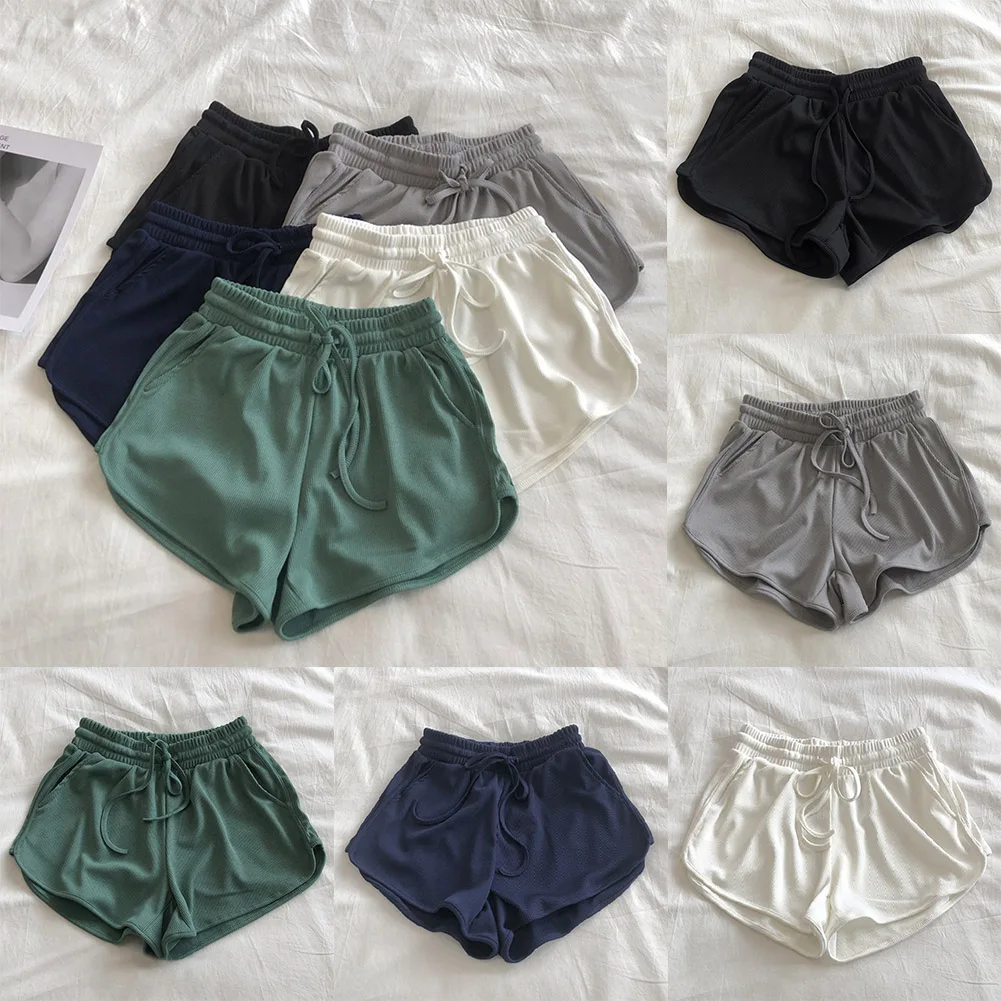 Cómodos pantalones cortos de pierna ancha de color sólido para mujer con detalle de cordones y material de hilo de seda helada para uso en primavera al invierno